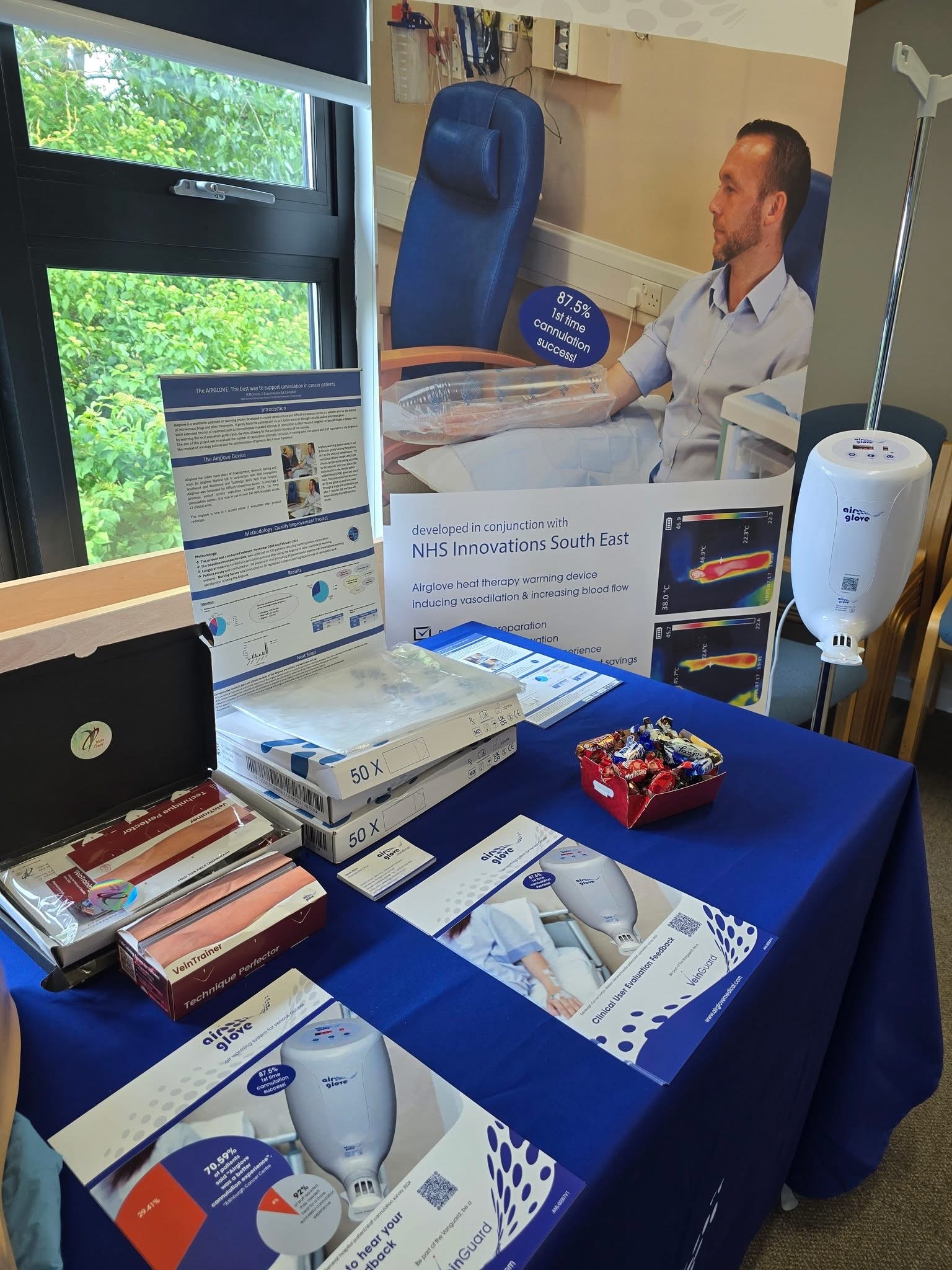 Airglove display with VeinTrain training materials at a vascular access event