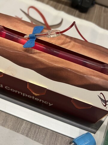 VeinTrain FlatPack simulation vein with a cannula on its training pack